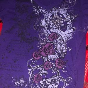 This is an early 2000s type shirt with a v neck